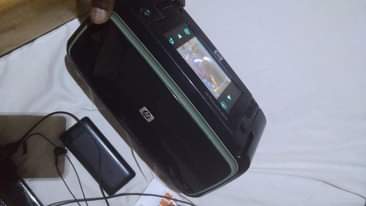 A picture of Nikon D7000 hp passport photo printer