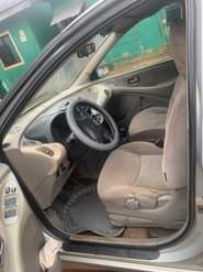 A picture of Clean Nigerian Used Nissan Almera Tino first body Fabric interior