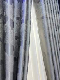 A picture of Curtains and rods