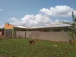 A picture of Plot of land with the permanent buildings