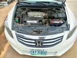A picture of Honda Accord 2009 neatly used. Engine gear and AC .