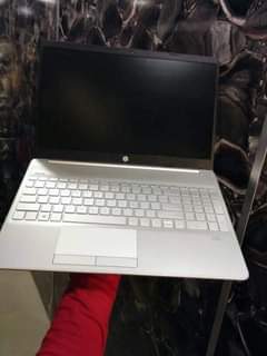 A picture of Laptop and iPhones