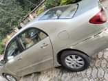 A picture of Distress 2004 clean Corolla with virgin engine chilling AC and