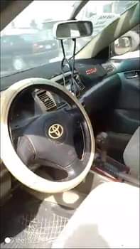A picture of Toyota Corolla 2004 model Straight body Engine has slight top