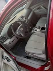 A picture of RED Neatly used ND registered Toyota Camry LE 2008 model