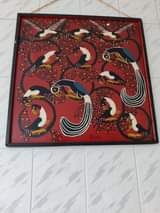 A picture of Tinga tinga painting on wood