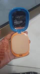 A picture of Jhumka and cosmetic