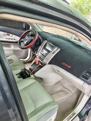 A picture of Extremely clean Lexus Rx 350 With untermpered Engine gear AC