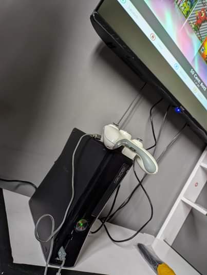 A picture of Xbox 360 2 controllers 20 Games 200k Location kimara kona