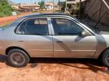 A picture of 1999 model Corolla Ac chilling Gear Engine Price 1 1m