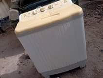 A picture of WASHING MASHINE KG 7 INAFUA NA KUSUUZA INAKAMUA NA KUKAUSHA