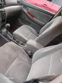 A picture of Toyota Corolla 2004 model body needs repackaging ac Is working