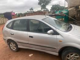 A picture of Clean Nigerian Used Nissan Almera Tino first body Fabric interior