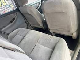 A picture of Corolla 04 everything working fine including AC Going for 3m