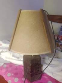 A picture of Gas cylinder and bedside lamp