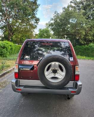 A picture of TOYOTA PRADO Year. 2000 Colour Maroon Engine 1Kz Gear. Automatic