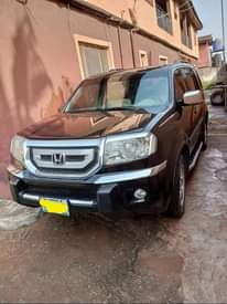 A picture of Honda Pilot 2010 model For sale my WhatsApp08064945586