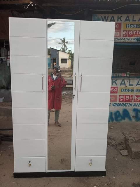 A picture of cup board three door