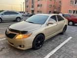 A picture of This is Camry 2010 model xle edition with thumb start