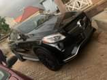A picture of 2018 Mercedes Benz GLE63s BRABUS Black on Black interior exterior