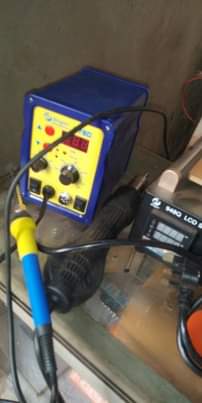 A picture of A phone repair blower machine and a screen separator