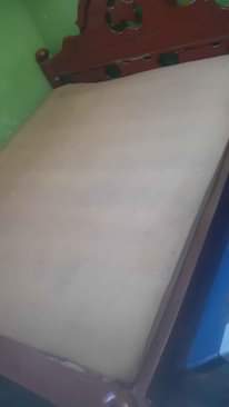 A picture of  kitanda godoro vyote 80k . . sofa 70k 
