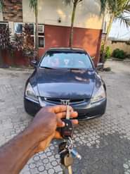 A picture of HONDA ACCORD 2004 MODEL very clean and straight body good