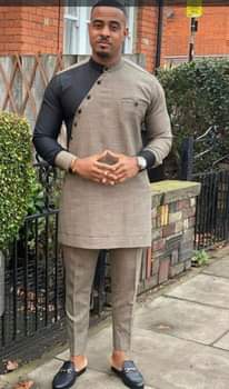 A picture of Men African suits.