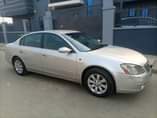 A picture of Nissan Altima 03 Gear working well Engine started smoking after