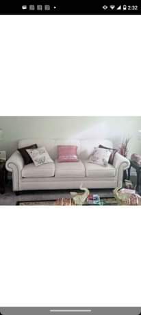 A picture of Beautiful loveseat and sofa set and dining room table four