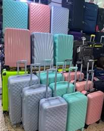 A picture of RUBBER SUITCASES