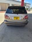 A picture of 2002 harrier gold colour sports