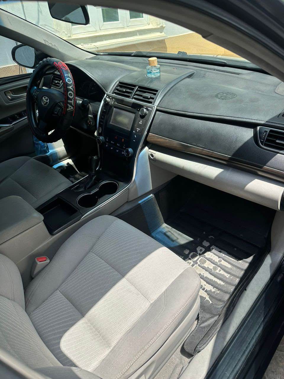 A picture of Toyota Camry 2015 model. No single fault. Price 10.5m .