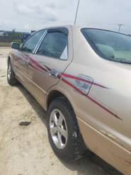 A picture of Camry Tiny Light Engine Gear Ac needs gas Interior Exterior