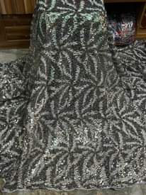 A picture of WEDDING GOWN MATERIAL FOR EXPENSIVE BRIDES AT AFFORDABLE PRICE Message