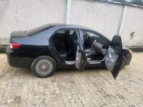 A picture of Sharp clean Toyota corolla 2013 model Buy n drive nothing