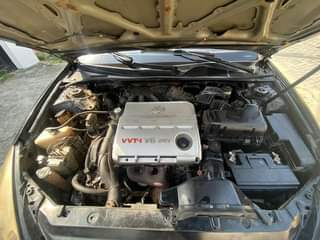 A picture of Partly First body Es300 Lexus 2003 with a very sound