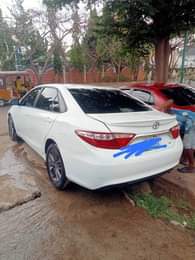 A picture of 2016 Toyota Camry with reverse camera screen Untampered engine and