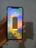 A picture of Iphone 11promax 64gig No condition... Location Lagos. WhatsApp 08116613146