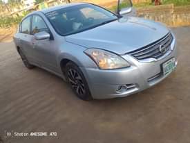 A picture of 2010 THUMB START NISSAN ALTIMA WITH ANDROID SCREEN.