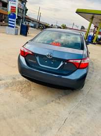 A picture of 2014 Toks Toyota Corolla. First body AC mortuary standard