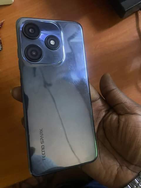 A picture of Nice looking original spark 10pro of 8gb ram and 128gb