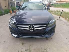 A picture of Good deal foreign used 2016 Mercedes benz C300 4matic Navy