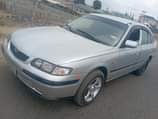 A picture of REG MAZDA 626 MANUEL DRIVE Sound and healthy engine good