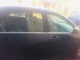 A picture of Toyota Corolla 06 model frst body with very low fuel