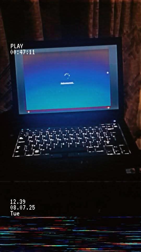 A picture of Dell latitude laptop with keyboard light