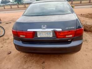 A picture of super clean 2004 model Honda Accord first body with unterperd