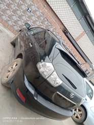 A picture of Neatly backed 2006 Lexus Rx330 Everything working perfectly Going for