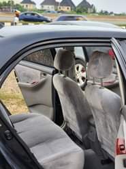 A picture of EXTREMELY SHARP PRE OWNED 2004 TOYOTA COROLLA LE CLEAN INTERIOR