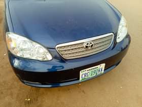 A picture of Distress two beautiful Corolla 03 04 model the two is